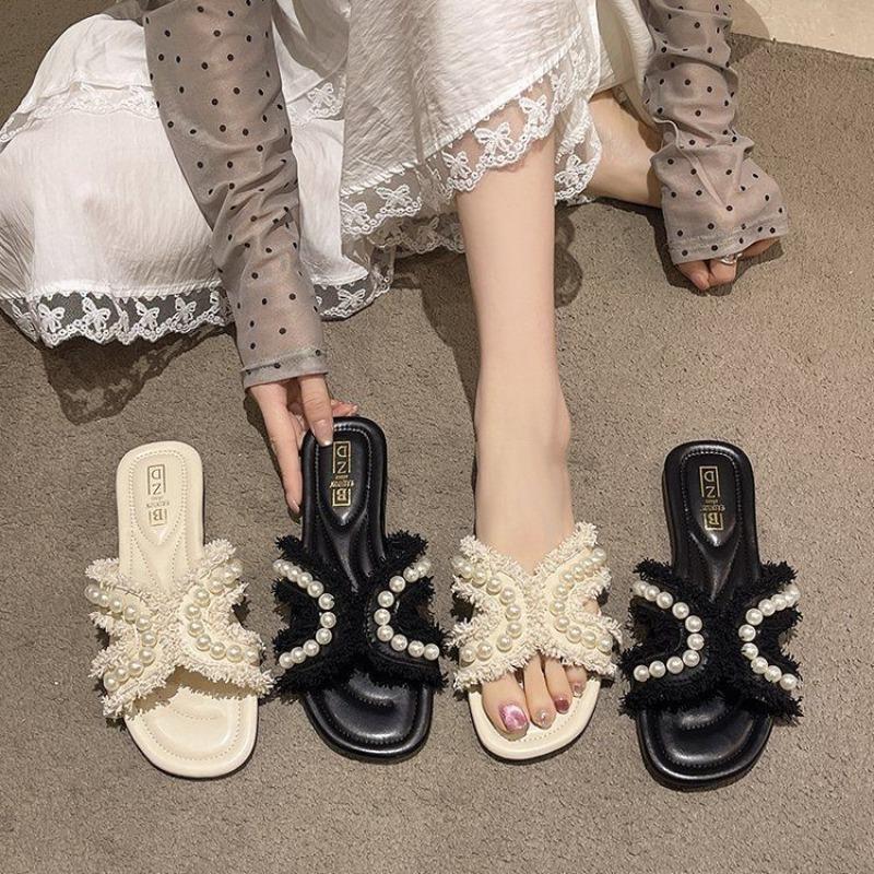 Flat-bottomed slippers women wear spring soft-bottomed fairy versatile pearl beach sandals summer new models