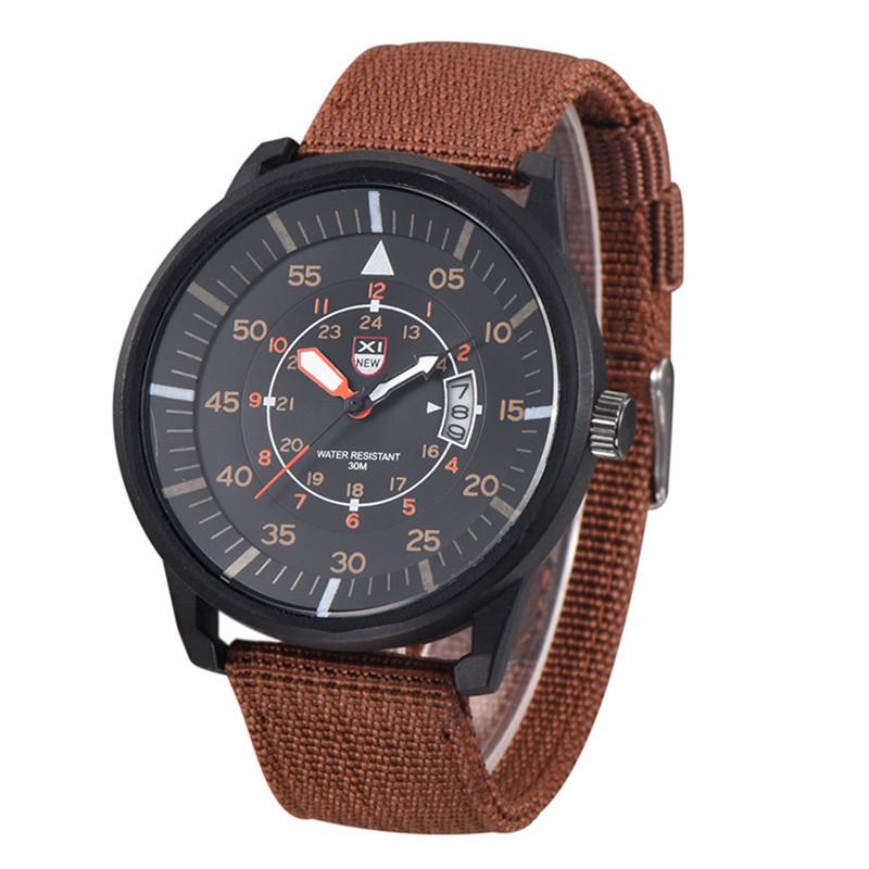 

XINEW Men s Quartz Sports Watch with Nylon Band and Date Function