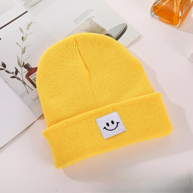Children's Smiling Face Hats In Stock Children's Candy Colored Knitted Hats with Embroidery Cold Hats for Boys Girls Smiling Face Logo Yarn Hats