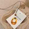 Vintage Ethnic Style Brown Hollow Geometric Circle Long Pendant Necklace For Women