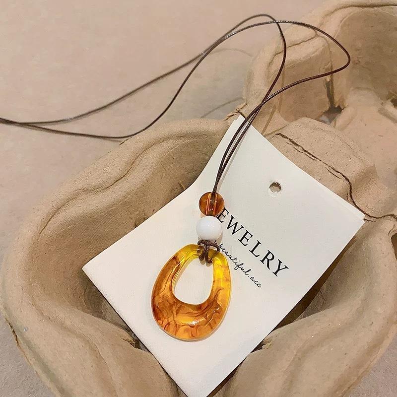 Vintage Ethnic Style Brown Hollow Geometric Circle Long Pendant Necklace For Women