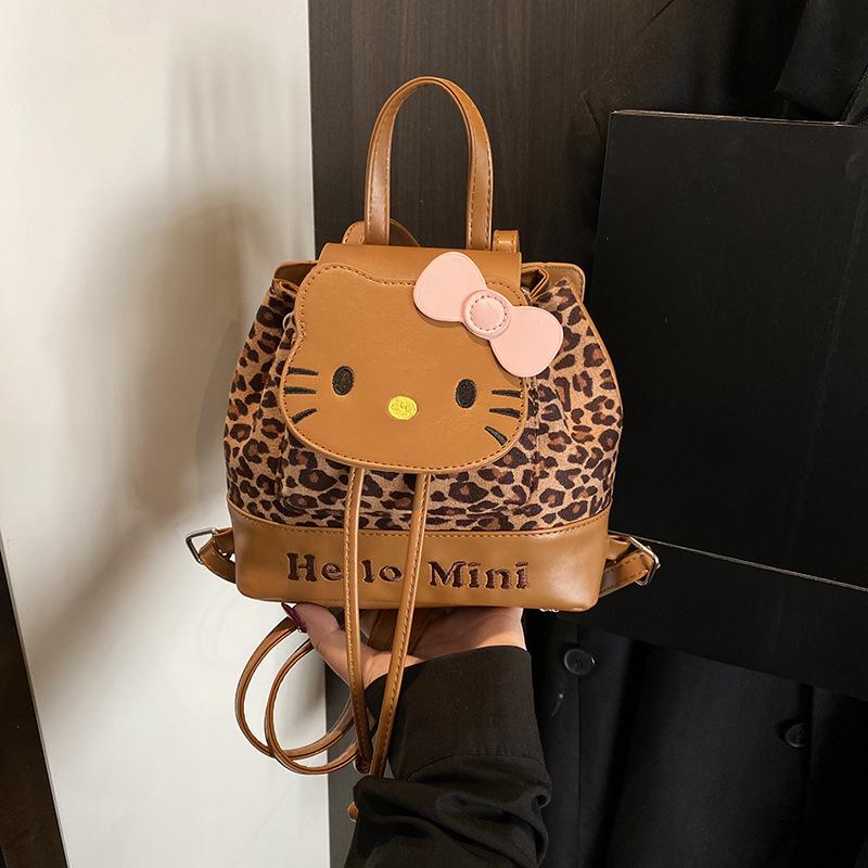 

2025 Осень/Зима Милый мультяшный рюкзак с кошкой для девочек - Универсальная маленькая детская дорожная сумка коричневый/леопардовый