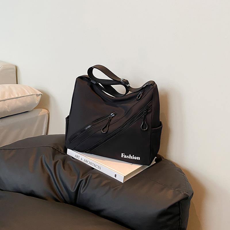 

New large-capacity casual simple computer men s and women s bags, personalized fashion shoulder bags, commuter messenger armpit bags чёрный