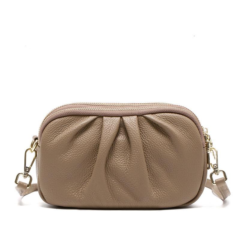 Leder-Damenhandtasche, High-End-Handytasche, neue erste Schicht Rindsleder Münztasche, dreilagige Reißverschluss-Falten-Umhängetasche.