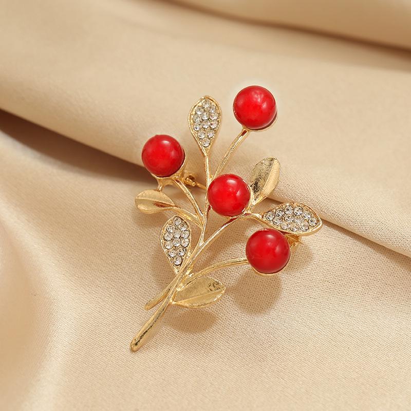 Elegante Schmetterlingsbrosche mit Perle – Damen-Modeschmuck-Anstecknadel von hoher Qualität