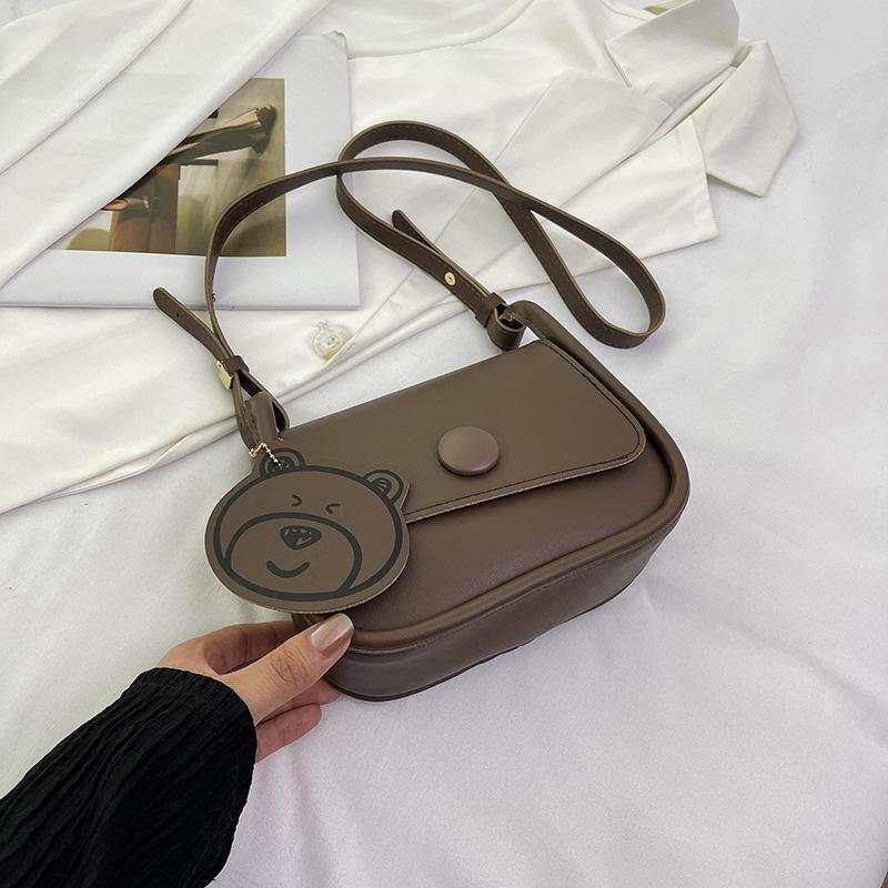 

Весняний тренд 2024 р. Модна мода через плече Проста повсякденна мода для приміських поїздок Маленька квадратна сумка Ніша Повсякденна сумка через плече