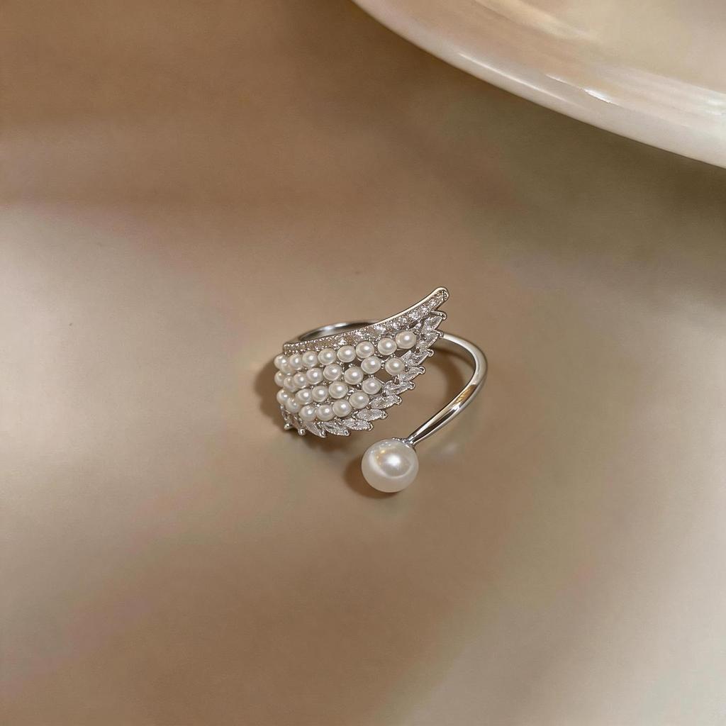 Elegant Zirconia Pearl Ring - Luxurious French Design with Wing Detail for Women