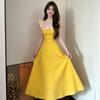 French holiday style yellow dress women's summer 2026 new super fire wear with floral suspenders long skirt sleeveless