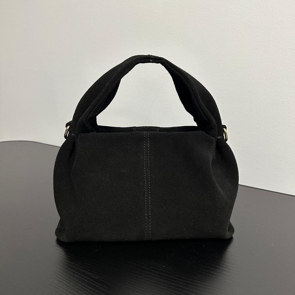 Haute couture first layer cowhide pleated cloud bag niche high-end handbag oblique span shoulder bag women's 2025 new