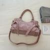 Motorcycle-style Bag with A Lady's Crossbody Strap for Commuting, A Shoulder Bag, and A Tote Bag.