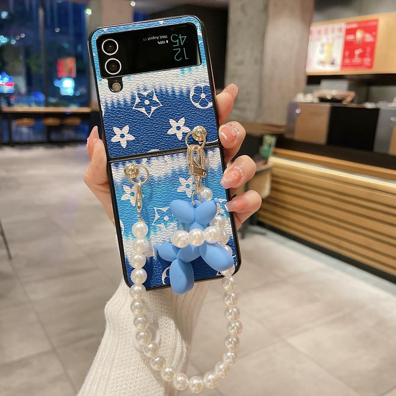 Custodia a cuore di lusso con fiocco in strass 3D con braccialetto di perle per Samsung Galaxy Z Flip 3 Z fold 4 Z Flip 5 Cover per Huawei P50 Pocket / oppo find N2