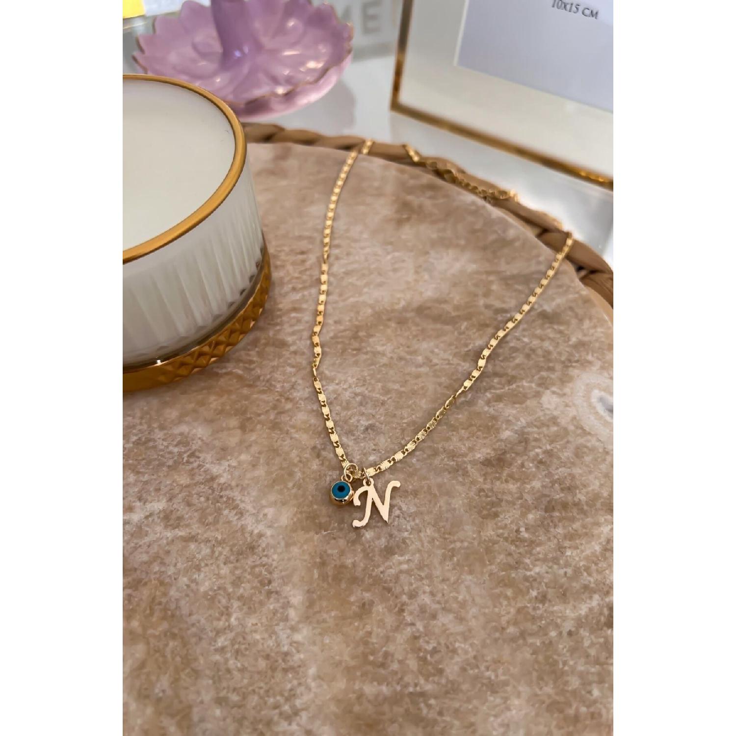 

Тонкое ожерелье-цепочка с буквой N и подвеской от сглаза 50 cm