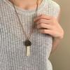 Ceramic Pearl Tassel Necklace: Chic Ethnic Style Sweater Chain Set for Women