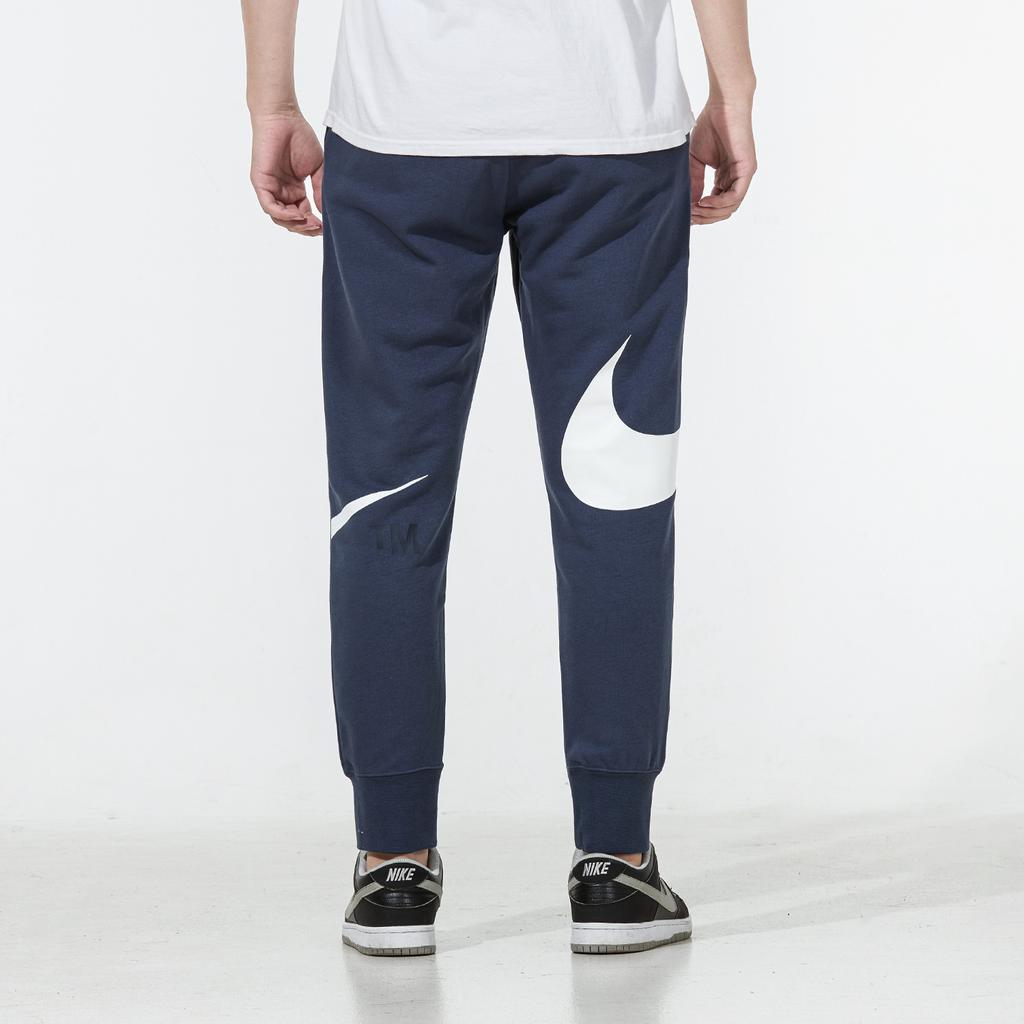 Nike Pánské pletené joggery se stahovací šňůrkou s velkým logem Swoosh Modré DD6092-437