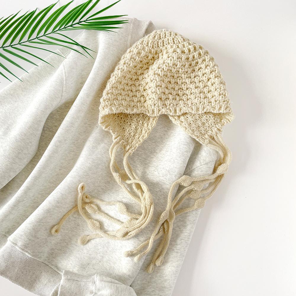 Sweet hollow knitted bag head hat autumn and winter travel photo single product fringed strap red knitted wool hat women