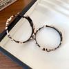 Silver needle leather leopard print wrapped round stud earrings Hong Kong-style millennial personalized earrings light luxury high-end earrings