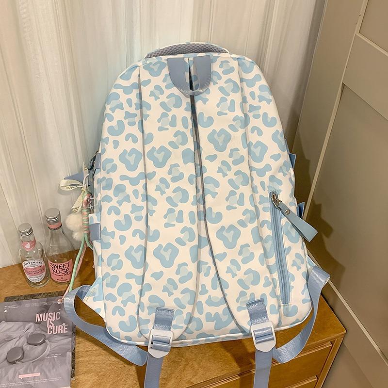 New Harajuku Cow Leopard Print Backpack, Light Make-up Class for Junior High School Students, and Large-capacity Backpack.