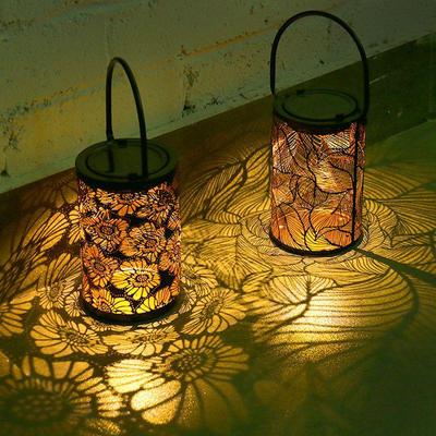 Wrought Iron Solar Lantern: Waterproof Outdoor Light & Shadow Projector for Garden and Courtyard Decoration