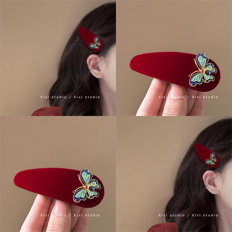 

Enamel Butterfly Hair Clips Flocked BB Clips Headwear Fashionable and Sophisticated Bangs Clips for Ladies 1pc червоний
