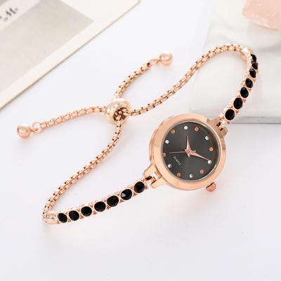 Damen-Armbanduhr mit Strasssteinen, rundem Zifferblatt und Kettengliedern