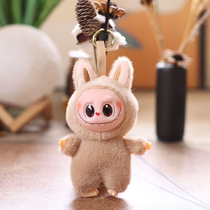 

Поколение LABUBU Плюшевая кукла-подвеска Милая виниловая игрушка 17Cm светло-коричневого