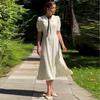 European and American women's clothing 2026 summer new French style lace-up lotus leaf collar bubble sleeve high waist polka dot dress