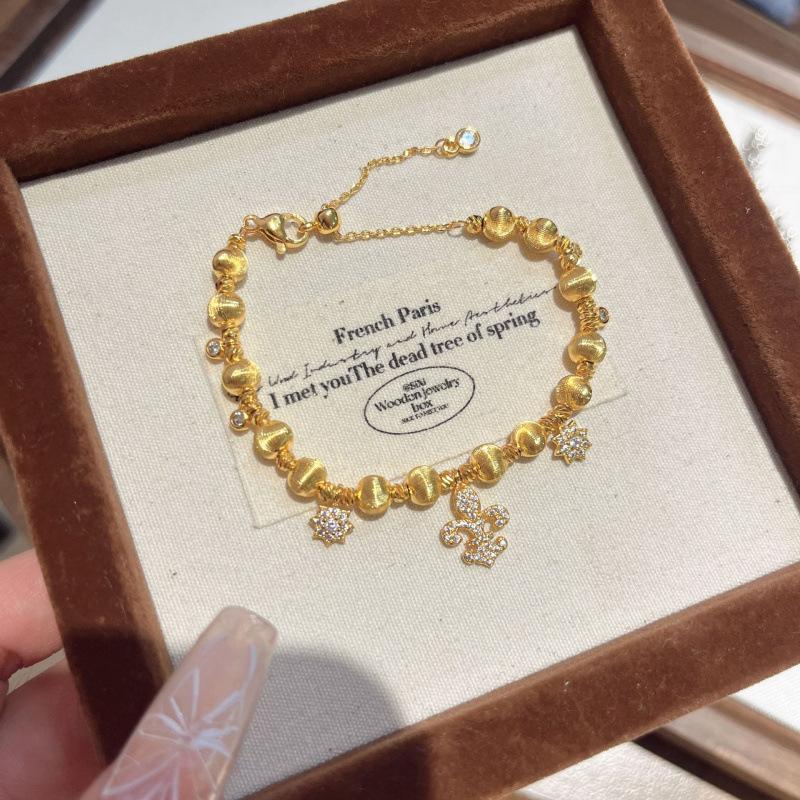 

Medieval Vintage Iris Snowflake Cat Eye Bead Bracelet Light Luxury Old Money Wind Light Bulb Flash Jewelry