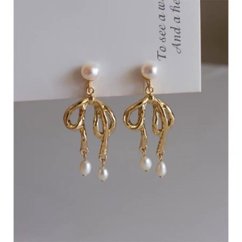 Sweet and cool personality natural freshwater pearl bow mosquito coil disc earclip temperament cold wind earrings women's stud earrings