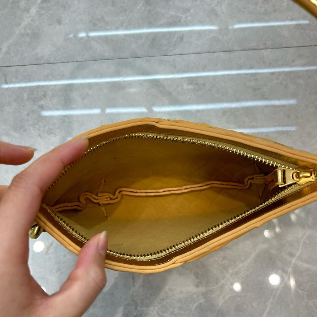 2026 Été nouvelle tendance cuir sac d'aisselle transfrontalier mode décontractée cuir de vachette sac d'aisselle main poignet femmes