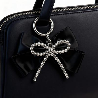 Unique Silver Bowknot Decors Keychain Charm for Fashion Enthusiasts Perfect Gift Lightweight Design Key Adornment