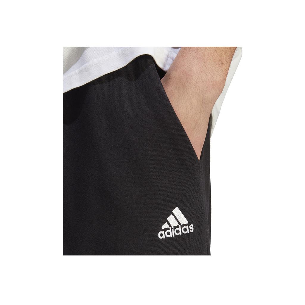 Adidas Jednobarevné tepláky se stahovací šňůrkou a rovnými nohavicemi Pánské spodní díly Černé IC9425