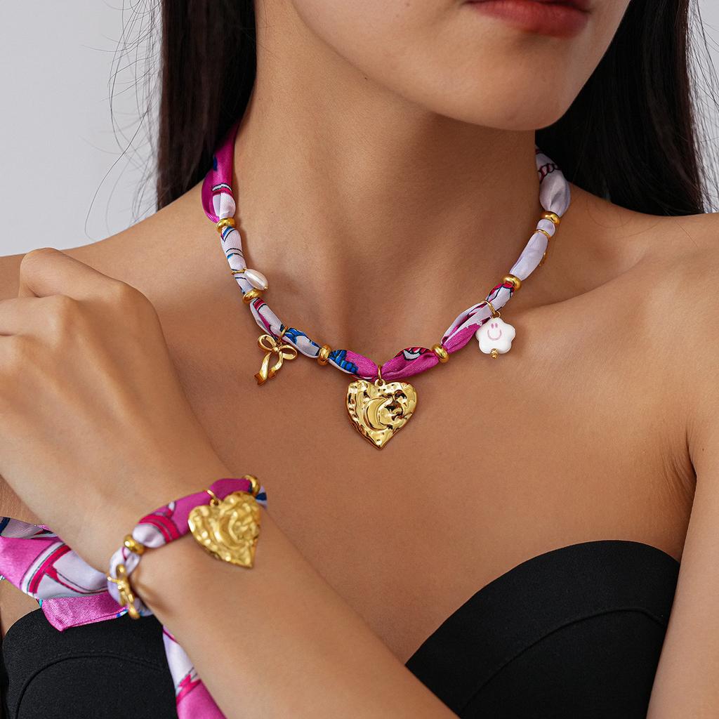 Acciaio inossidabile stampa tessuto cavo sole amore clavicola catena stile etnico autunno e inverno nicchia collana
