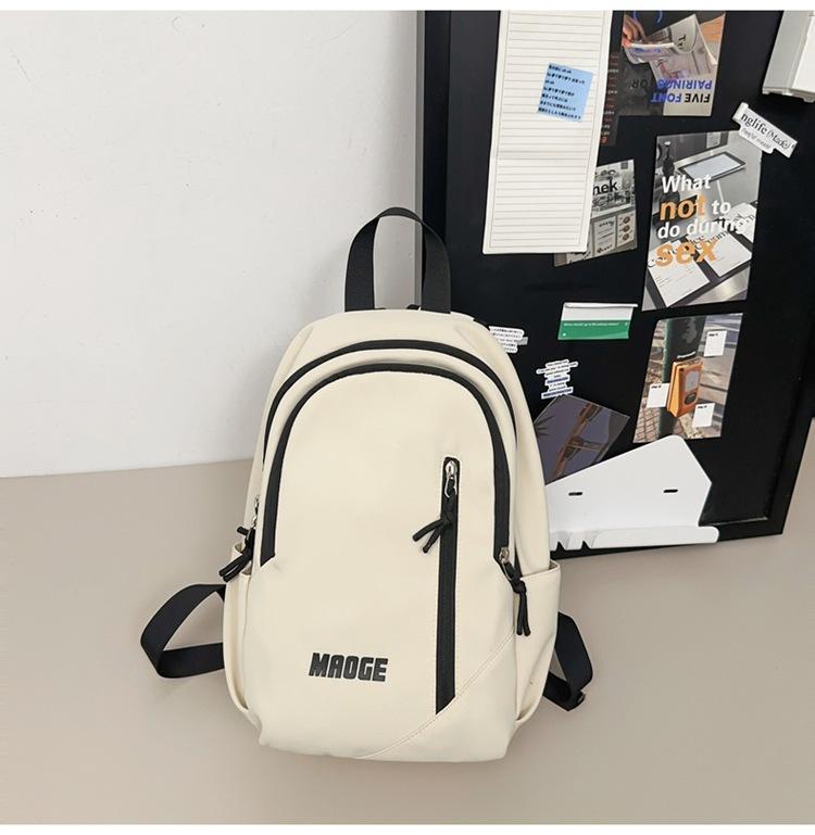 

New solid color middle school schoolbag large capacity backpack female junior high school student Oxford cloth hairball schoolbag белый