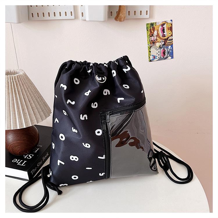 

New drawstring large-capacity commuting pain bag simple backpack cute casual sweet two-dimensional student backpack female чорний