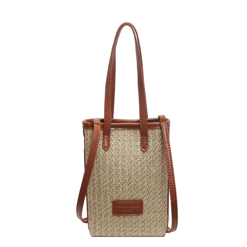 Niche lightweight versatile rainbow straw mobile phone bag spring and summer explosion leisure vacation style commuter messenger bag woman