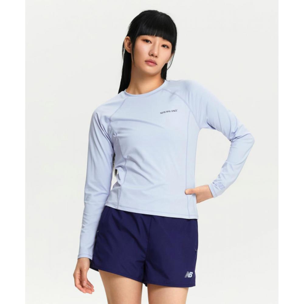 

NEW BALANCE NBNDE3W702 ЖЕНЩИНЫ Рашгард свободного покроя с длинными рукавами, СИНИЙ