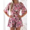 Elegante Tuta da Donna con Stampa Floreale Senza Schiena per Look Estivi Chic