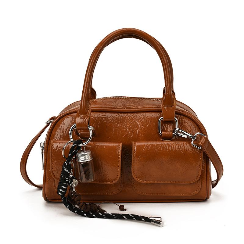 

Fashion foreign style bowling bag handbag women s 2025 new fashionable Boston bag shoulder messenger bag no pendant коричневый