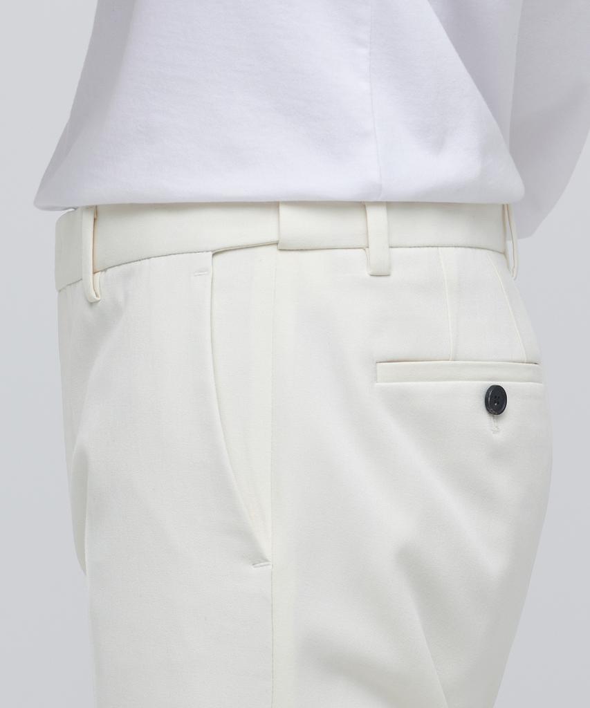 MUSINSA STANDARD Tapered Hidden Elastic Waist Length Slacks [Cream]
