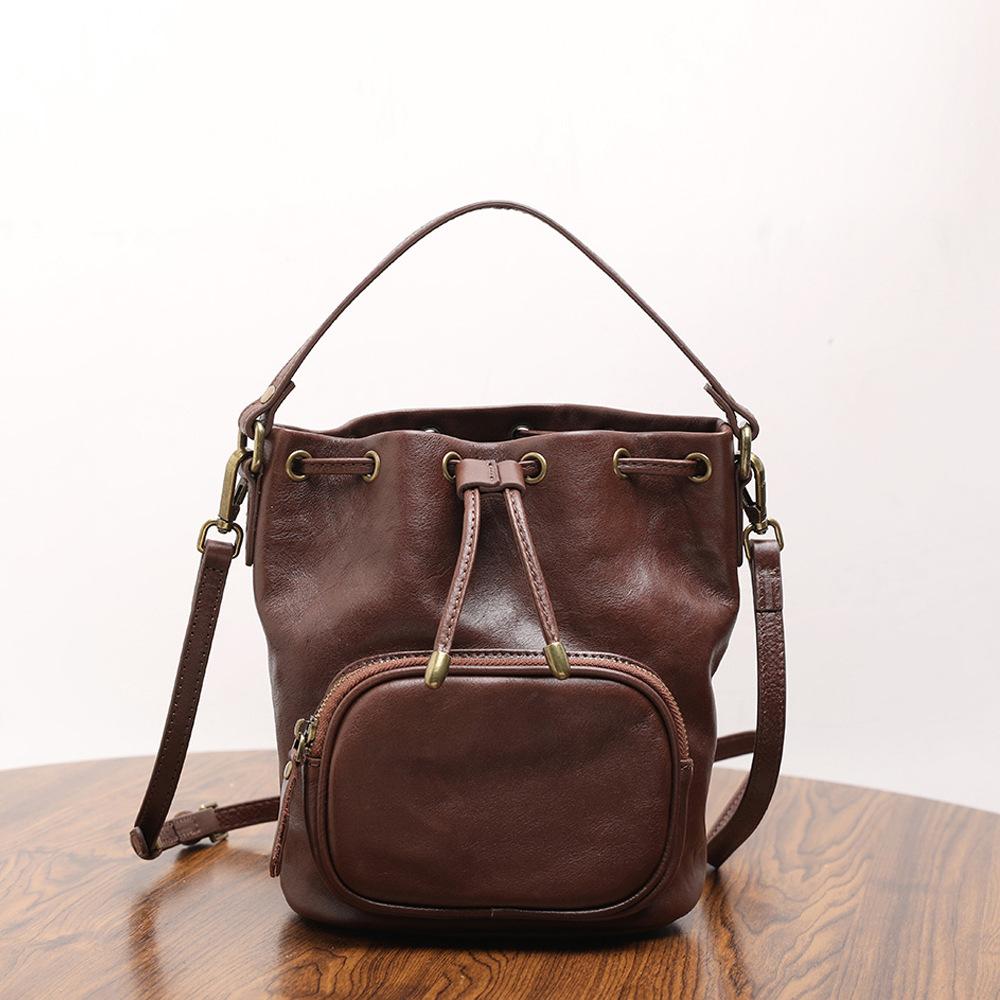 

2025 Retro Women s Single-shoulder Bag Made Cowhide Water Bucket Genuine Leather Designer Luxury Bag 18x11x22cm