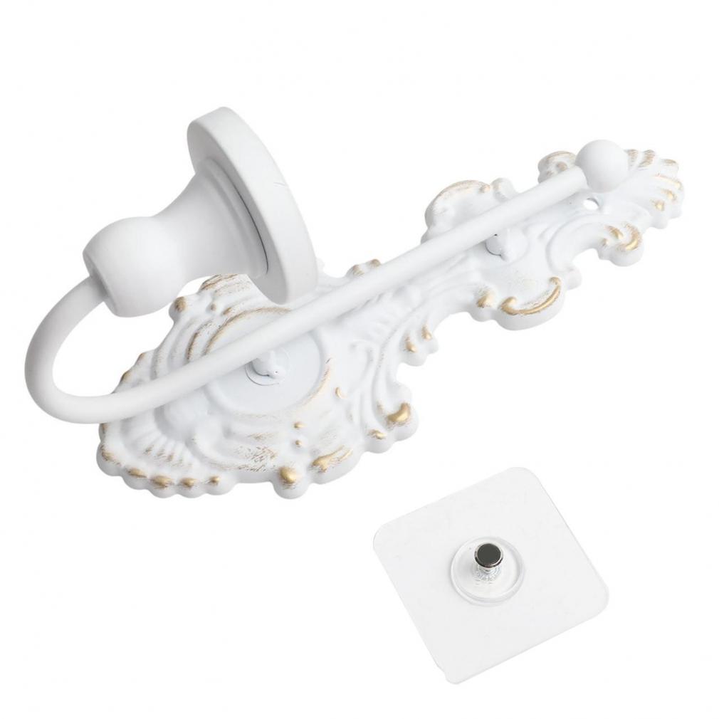 Vintage nástěnný svícen na úzké svíčky, starobílá litinová dekorace