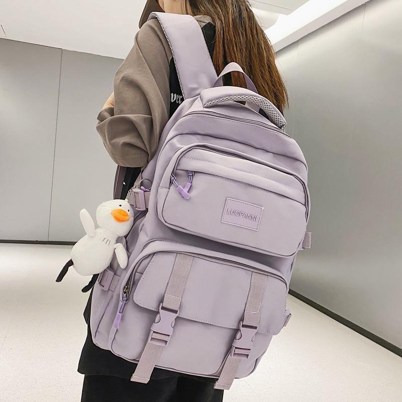 Solid color multi-pocket schoolbag female Korean version high school college student backpack light color couple large capacity ins backpack