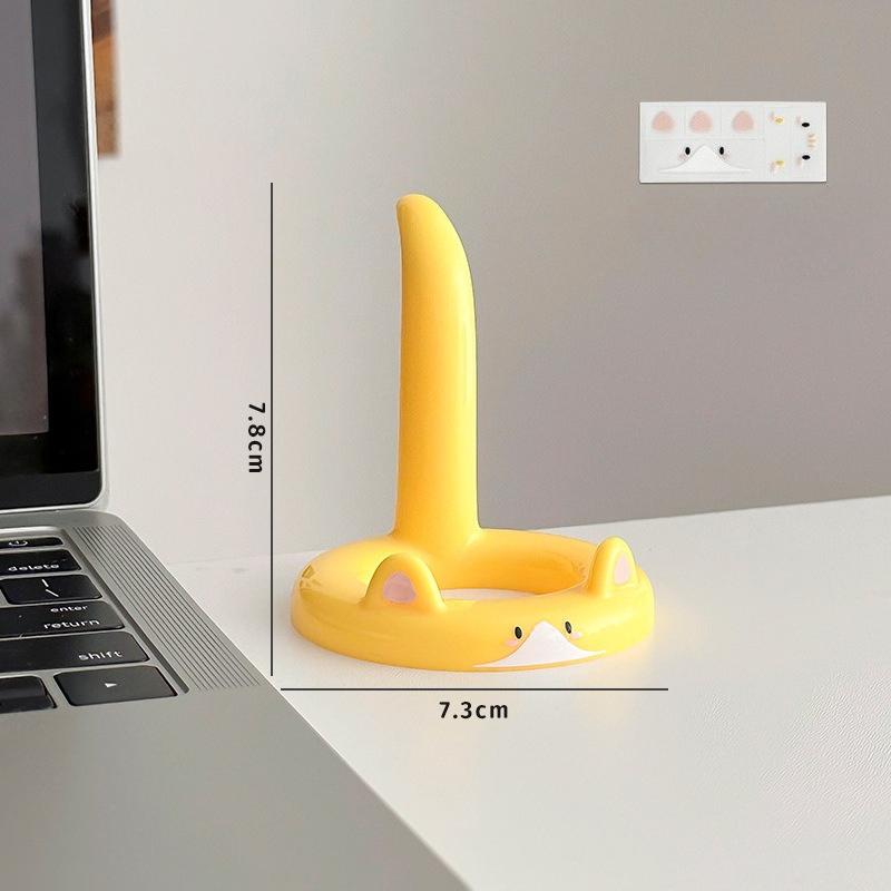 

Desktop lazy stand multifunctional mini compact mobile phone stand creative cartoon cat tablet stand жовтий