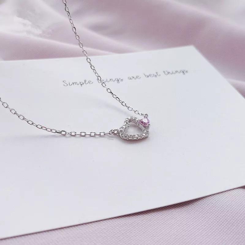 Beixi S925 Sterling Silver Heart Necklace - Cute Hollow Peach Pendant, Simple and Versatile Design.