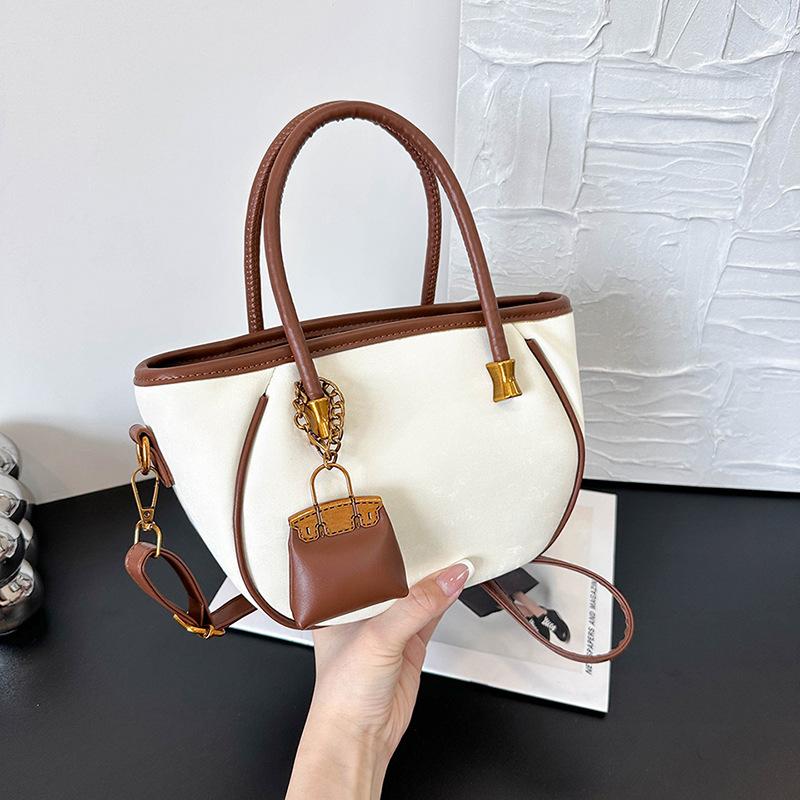 

Niche design retro handbag women s new fashion versatile shoulder messenger bag bucket bag белый