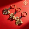Heavenly Fortune Charm: Lucky Keychain with Ruyi, Pixiu, and Beckoning Cat.