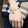 High-End Fashion Stripe Leather Bracelet with Gold-Plated Metal Accents