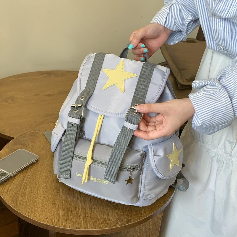 Schultasche neues koreanisches Nischen-Design Sternen-Rucksack Damen leichter Reise-Rucksack kleiner Studenten-Freizeit-Rucksack