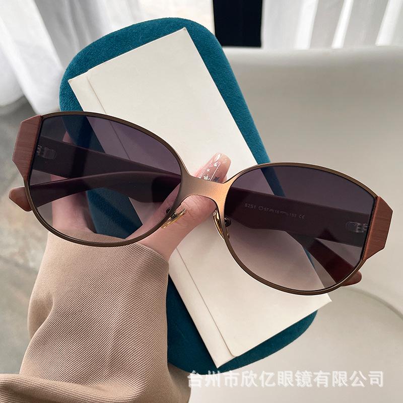 New personalized cat eye futuristic sunglasses women's high-end splicing UV-proof metal sunglasses