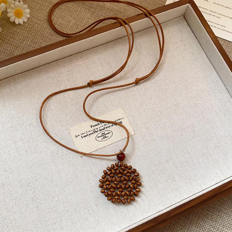 Retro Ethnic Heart Necklace: Wooden Flower Pendant Sweater Chain for Women